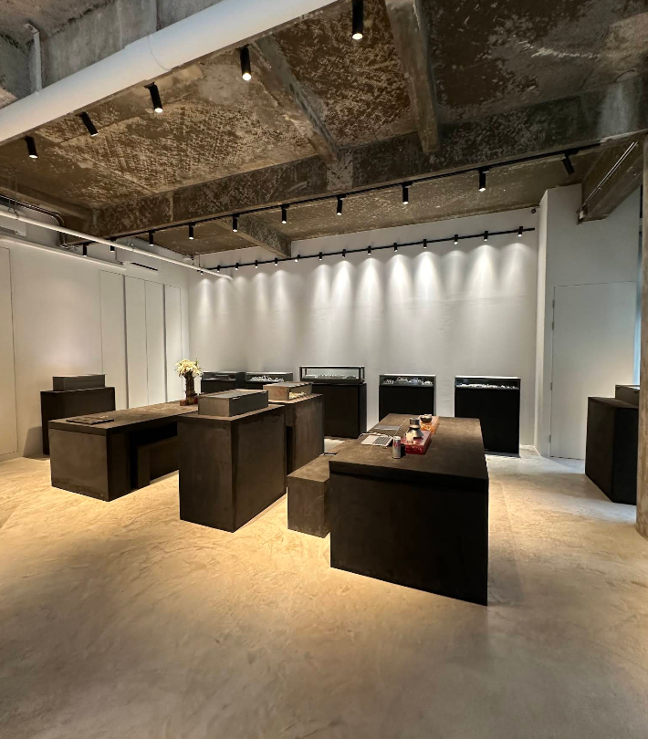 Parts of Four jewelry showroom with dark industrial aesthetic