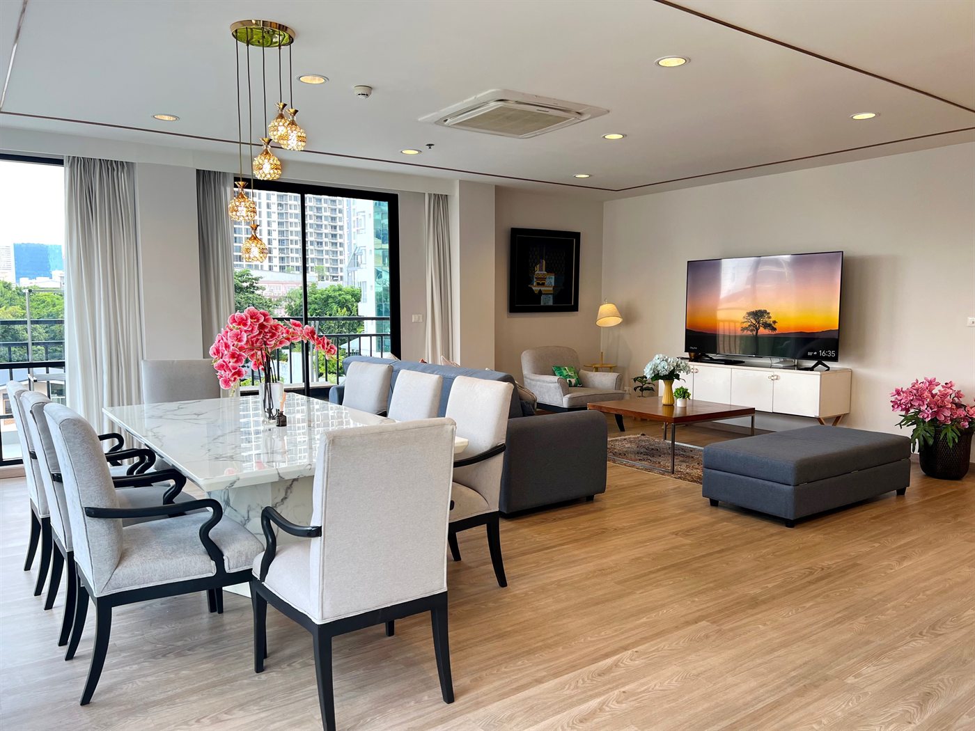 Residence 301 open-plan living and dining room with city view